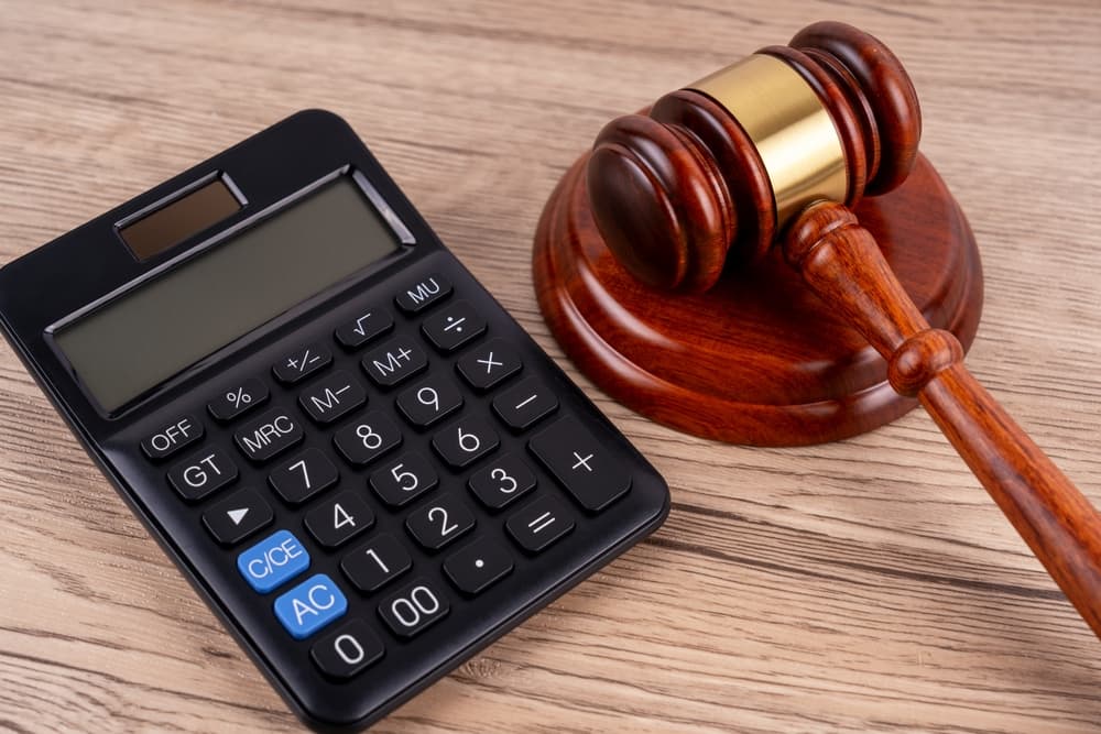 Top view of gavel and calculator