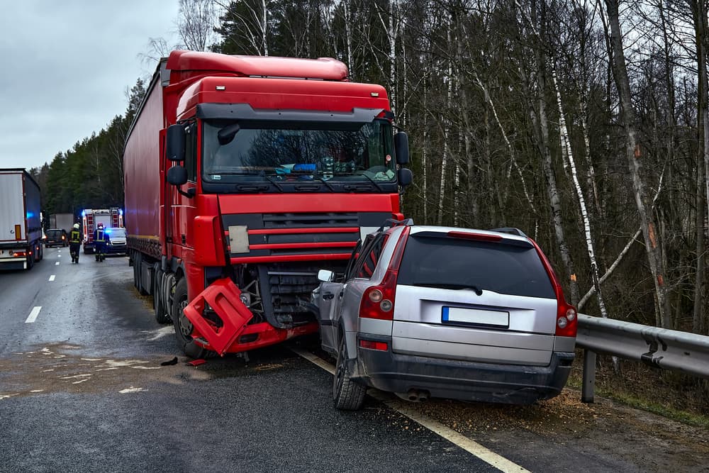 Collision between truck and car